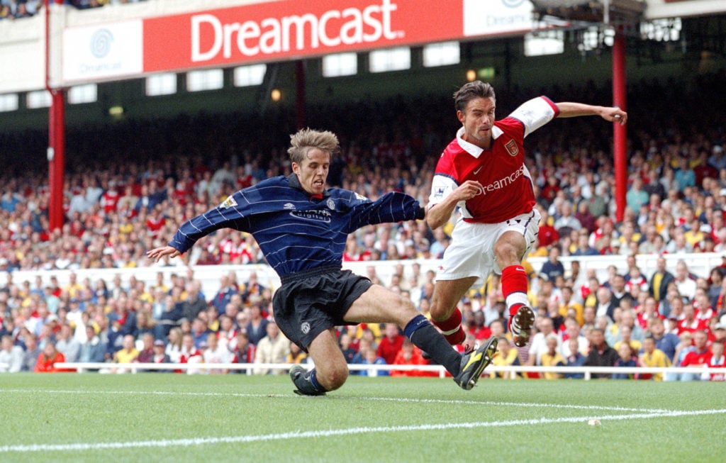 22 August 1999 - Premiership Football - Arsenal v Manchester United - Phil Neville of Manchester United and Marc Overmars of Arsenal - (photo by Ma...