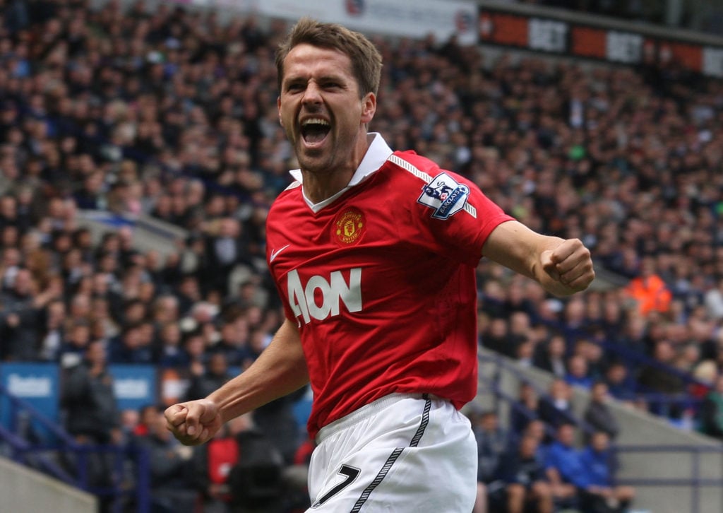 Michael Owen of Manchester United celebrates scoring their second goal during the Barclays Premier League match between Bolton Wanderers and Manche...