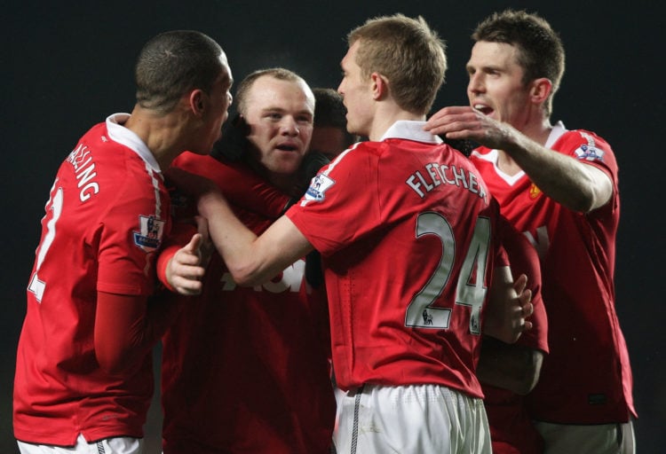 Wayne Rooney of Manchester United celebrates scoring their first goal during the Barclays Premier League match between Chelsea and Manchester Unite...