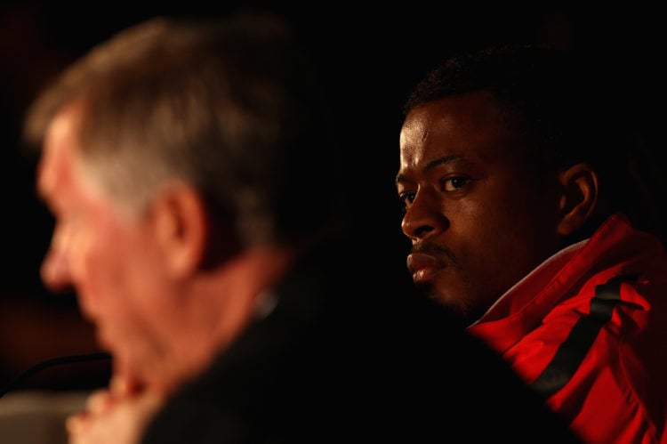 Manager, Sir Alex Ferguson speaks to the media as defender Patrice Evra looks on during the Manchester United press conference at Lords on April 5,...