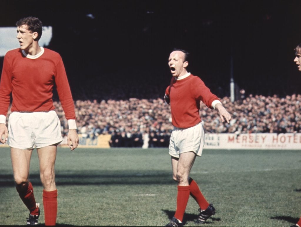 NOBBY STILES SHOUTS INSTRUCTIONS TO HIS FELLOW MANCHESTER UNITED TEAM MATES DURING A MATCH. Mandatory Credit: Allsport Hulton/Archive