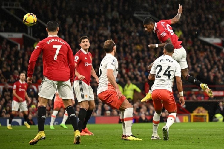 Manchester United's English striker Marcus Rashford (R) has this header saved during the English Premier League football match between Manchester U...