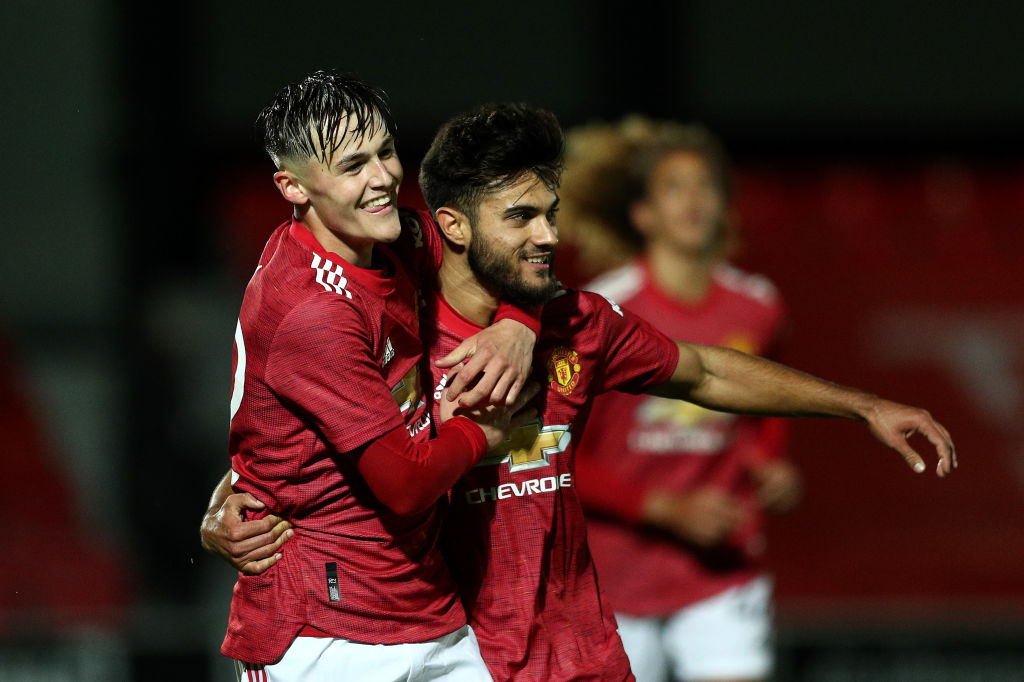 Arnau Puigmal of Manchester United U21 celebrates his goal with Mark Helm of Manchester United U21 during the EFL Trophy match between Salford and ...