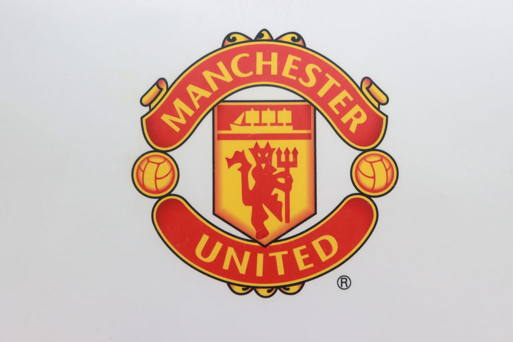 A Manchester United FC badge is seen outside Old Trafford, the home of Manchester United FC, on March 26, 2021 in Manchester, England.