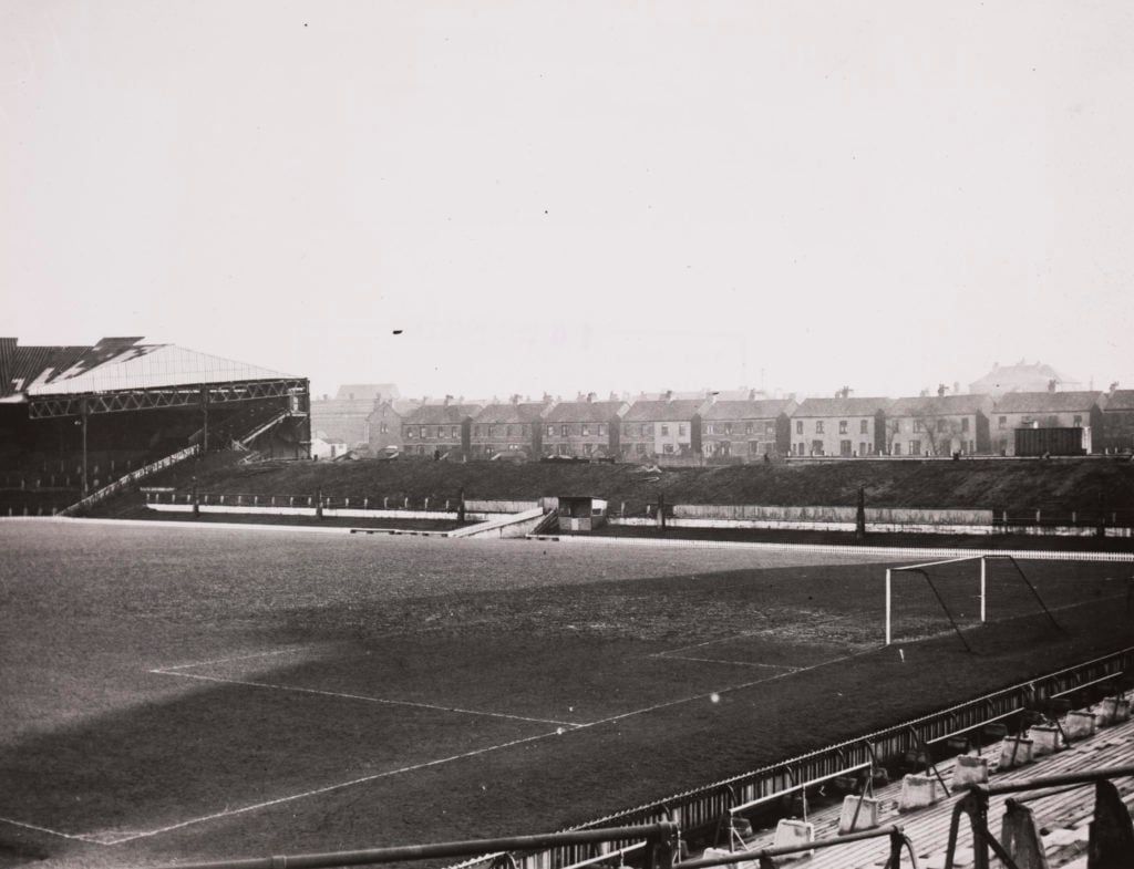 Bomb damage to Old Trafford, 1948. A photograph, taken in 1948, showing bomb damage to the main stand at Manchester United's football ground, Old T...