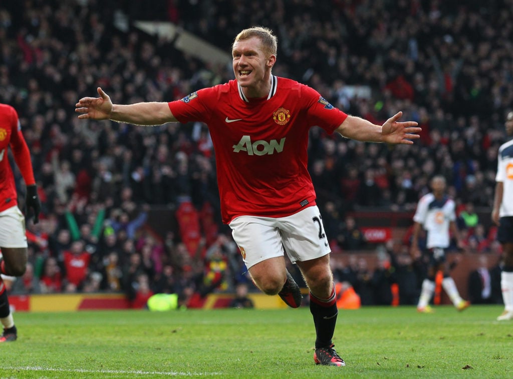 Paul Scholes of Manchester United celebrates after scoring the opening goal during the Barclays Premier League match between Manchester United and ...