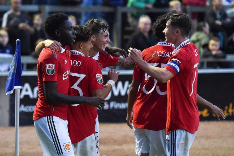 Charlie McNeill of Manchester United U21s celebrates scoring their first goal during the Papa John's Trophy match between Carlisle United U21s and ...