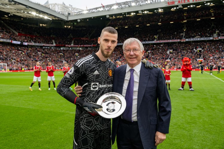 Former Manager Sir Alex Ferguson congratulates David de Gea of Manchester United on his 500th appearance for Manchester United ahead of the Premier...