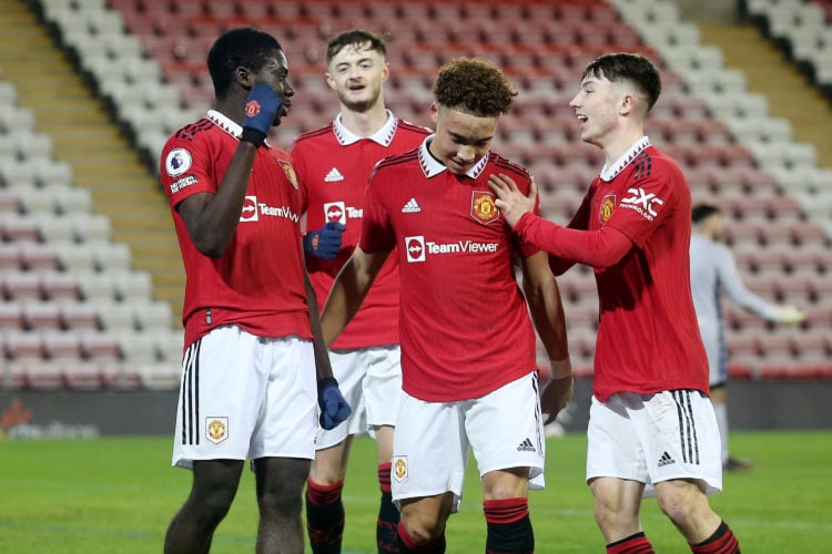 Omari Forson, Joe Hugill, Sam Murray and Daniel Gore of Manchester United celebrate during the Premier League 2 match between Manchester United and...