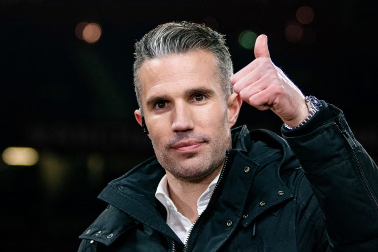 Robin van Persie reacts prior to the UEFA Europa League knockout round play-off leg two match between Manchester United and FC Barcelona at Old Tra...