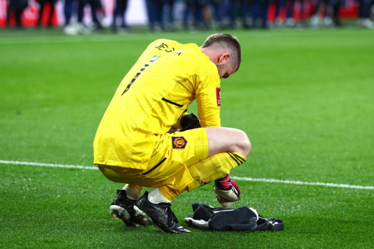 David De Gea of Manchester United reads notes during the penalty shoot-out following the Emirates FA Cup Semi Final match between Brighton & Ho...