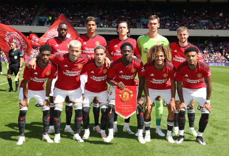 The Manchester United tea lines up ahead of the pre-season friendly match between Manchester United and Olympique Lyonnais at BT Murrayfield Stadiu...