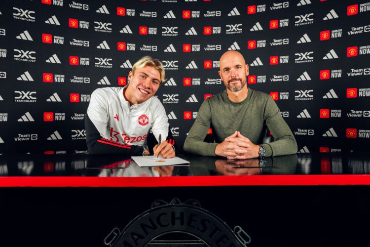 (EXCLUSIVE COVERAGE) Rasmus Hojlund of Manchester United poses with Manager Erik ten Hag after signing for the club at Carrington Training Ground o...