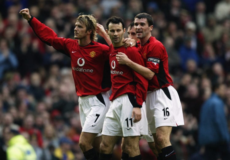 Ryan Giggs of Manchester United celebrates his goal with team-mates David Beckham (left) and Roy Keane (right) during the FA Cup fourth round match...