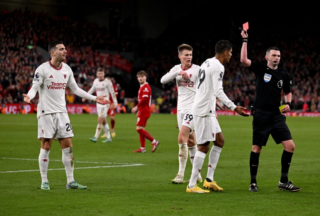 (THE SUN OUT, THE SUN ON SUNDAY OUT) Diogo Dalot of Manchester United receiving a red card from referee Michael Oliver during the Premier League ma...