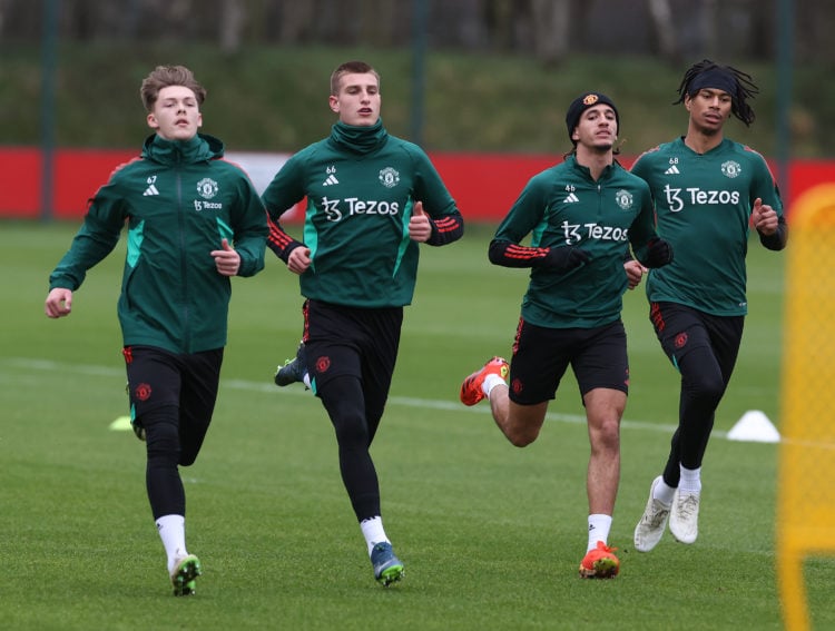 (EXCLUSIVE COVERAGE) Sam Mather, Rhys Bennett, Hannibal Mejbri, Maxi Oyedele of Manchester United in action during a first team training session at...