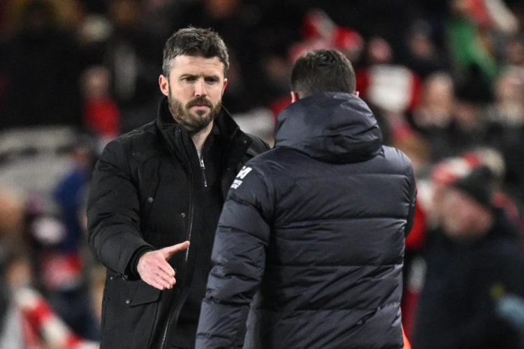 Chelsea's Argentinian head coach Mauricio Pochettino (R) congratulates Middlesbrough's English manager Michael Carrick (L) at the end of the Englis...