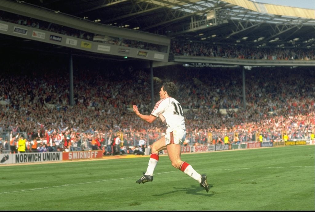 Mark Hughes of Manchester United celebrates after he scores his second goal during the FA Cup final against Crystal Palace at Wembley Stadium in Lo...