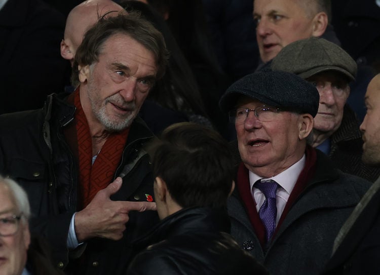 Sir Jim Ratcliffe of INEOS talks to Sir Alex Ferguson in the directors box ahead of the Premier League match between Manchester United and Tottenha...