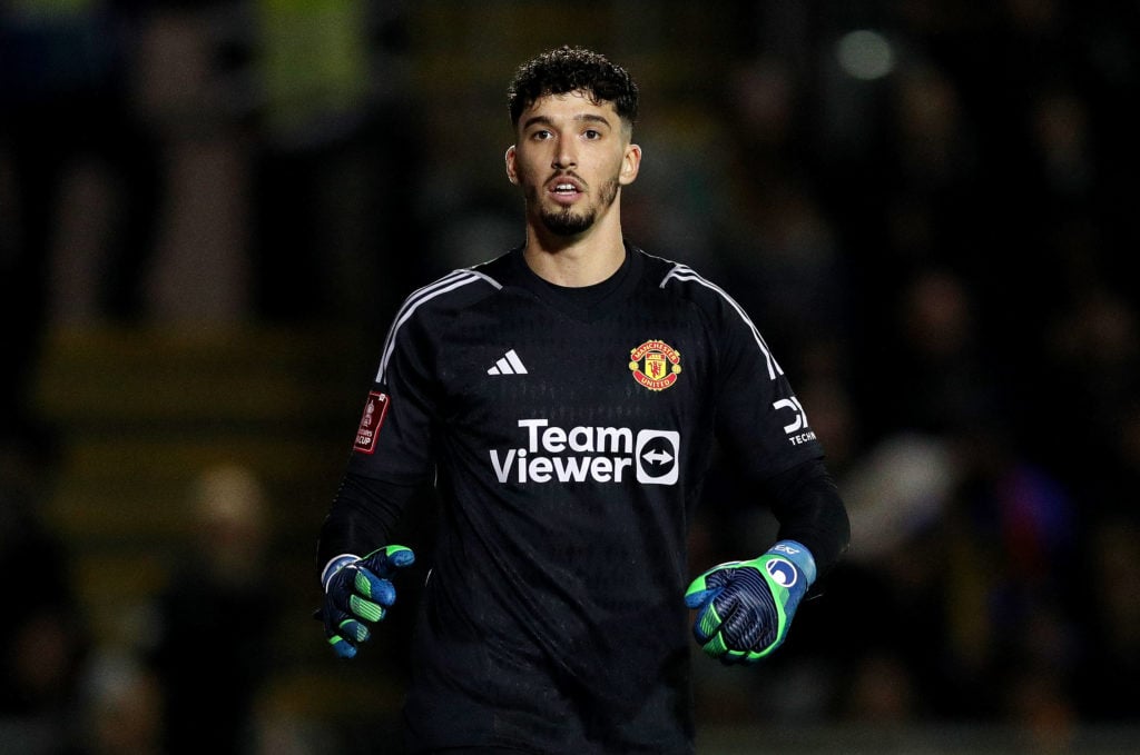 Altay Bayindir of Manchester United looks on during the Emirates FA Cup Fourth Round match between Newport County and Manchester United at Rodney P...