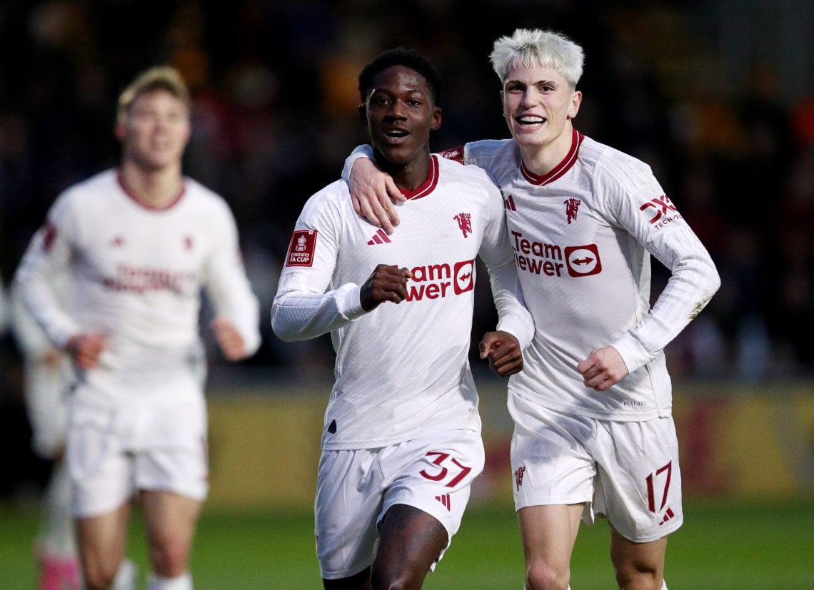 Kobbie Mainoo of Manchester United celebrates scoring his team's second goal with teammate Alejandro Garnacho during the Emirates FA Cup Fourth Rou...