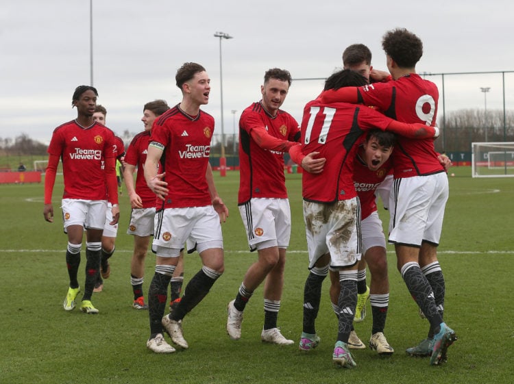 Ethan Williams of Manchester United U18s celebrates scoring their third goal during the U18 Premier League match between Manchester United U18s and...