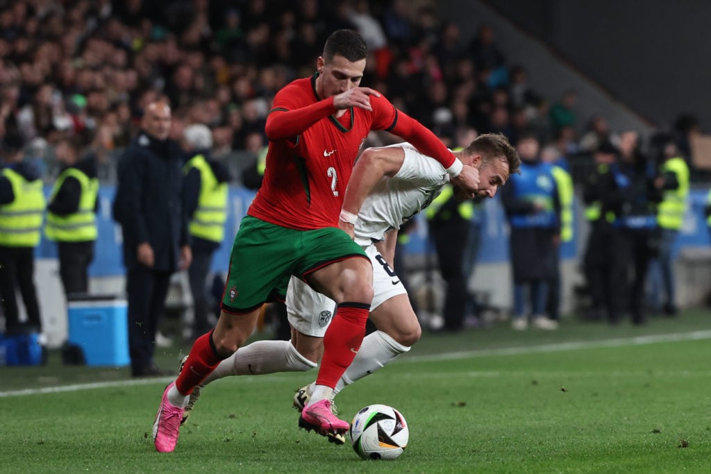 Diogo Dalot (2) of Portugal in action during the UEFA EURO 2024 qualifying playoff semifinal between Slovenia and Portugal at Stozice Stadium in Lj...