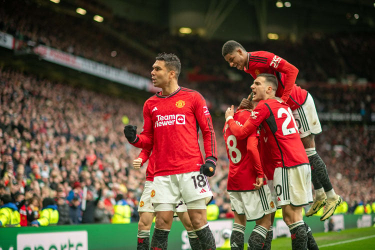 Bruno Fernandes of Manchester United celebrates scoring their first goal during the Premier League match between Manchester United and Liverpool FC...