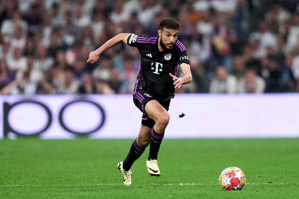 Noussair Mazraoui of FC Bayern Munchen runs with the ball during the UEFA Champions League semi-final second leg match between Real Madrid and FC B...