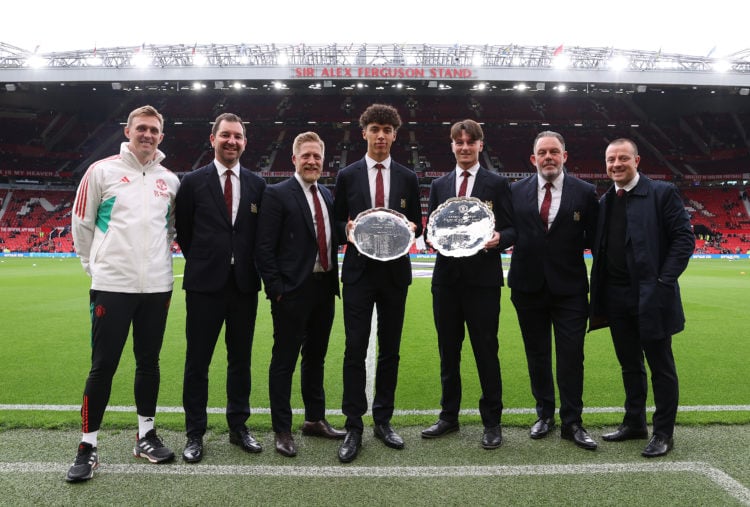 Ethan Wheatley and Elyh Harrison of Manchester United pose with the Jimmy Murphy Young Player of the Year award and the Denzil Haroun Reserve Team ...