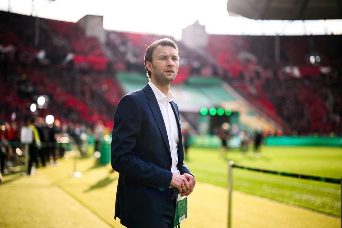 CEO sports Simon Rolfes of Bayer 04 Leverkusen looks on prior to the DFB Cup Final match between 1. FC Kaiserslautern and Bayer 04 Leverkusen at Ol...