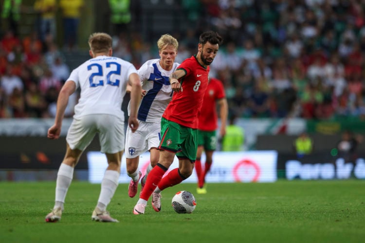 Bruno Fernandes of Portugal (R) tries to escape Matti Peltola of Finland  (L) during International Friendly match between Portugal and Finland at E...