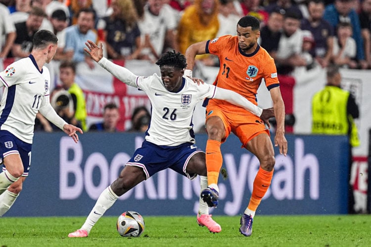 Kobbie Mainoo of England, Cody Gakpo of the Netherlands battle for the ball during the Semi-Final - UEFA EURO 2024 match between Netherlands and En...