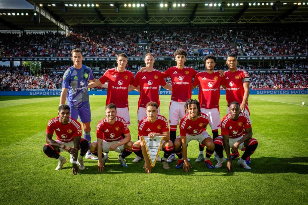 The Manchester United team (Back Row L-R: Radek Vitek, Will Fish, Jonny Evans, Ethan Wheatley, Ethan Williams, Casemiro. Front Row L-R: Marcus Rash...