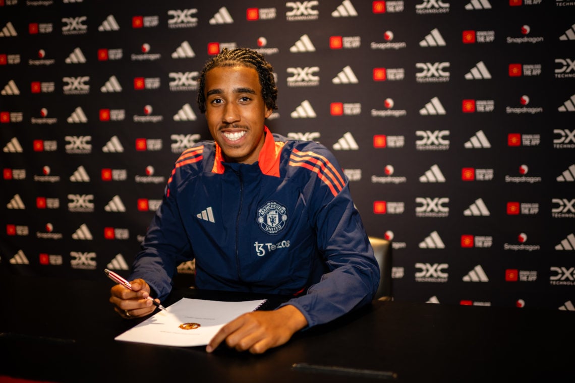 (EXCLUSIVE COVERAGE) Leny Yoro of Manchester United poses after signing for the club at Carrington Training Ground on July 18, 2024 in Manchester, ...