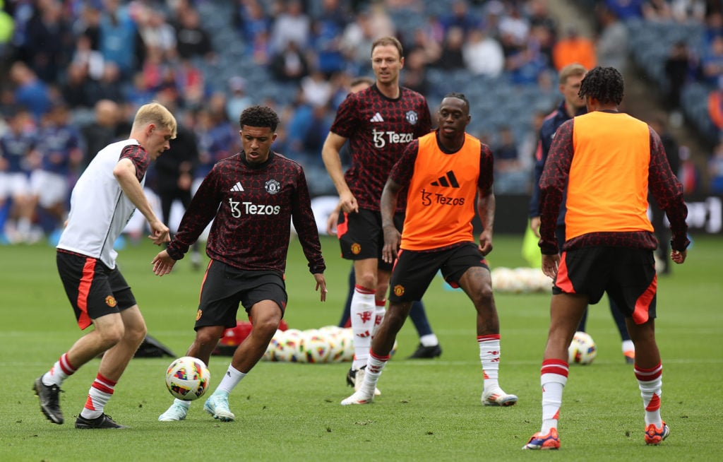 Toby Collyer, Jadon Sancho, Aaron Wan-Bissaka, Jonny Evans of Manchester United warms up ahead of the pre-season friendly match between Manchester ...