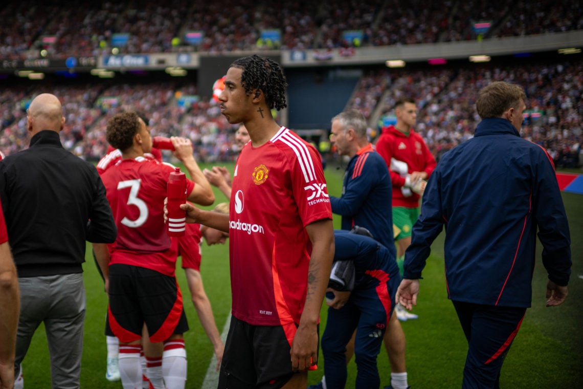 Leny Yoro of Manchester United walks out ahead of a pre-season friendly match between Manchester United v Glasgow Rangers at Murrayfield Stadium on...