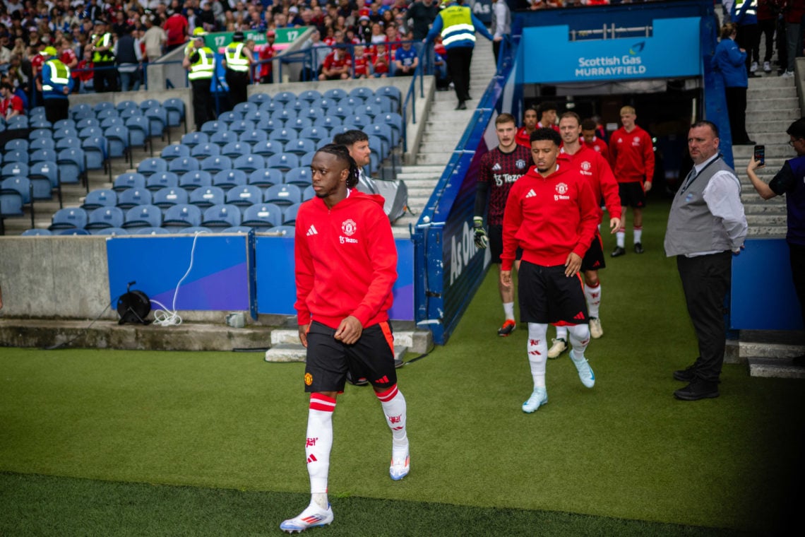 Aaron Wan-Bissaka of Manchester United walks out ahead of a pre-season friendly match between Manchester United v Glasgow Rangers at Murrayfield St...