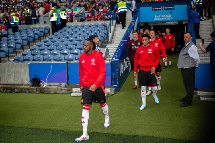 Aaron Wan-Bissaka of Manchester United walks out ahead of a pre-season friendly match between Manchester United v Glasgow Rangers at Murrayfield St...