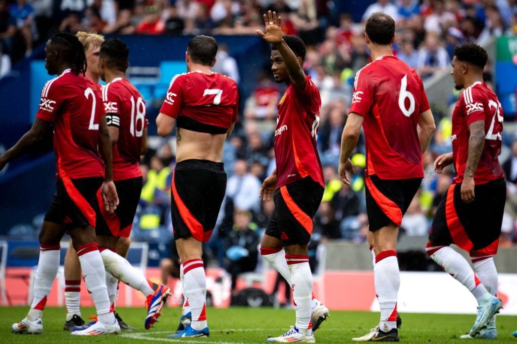 Amad of Manchester United celebrates scoring their first goal during a pre-season friendly match between Manchester United v Glasgow Rangers at Mur...