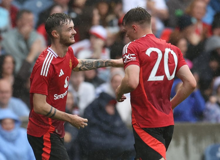 Joe Hugill of Manchester United celebrates scoring their second goal during the pre-season friendly match between Manchester United and Glasgow Ran...