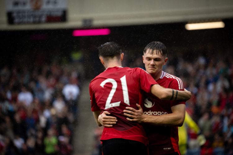 Joe Hugill of Manchester United celebrates scoring their second goal during a pre-season friendly match between Manchester United v Glasgow Rangers...