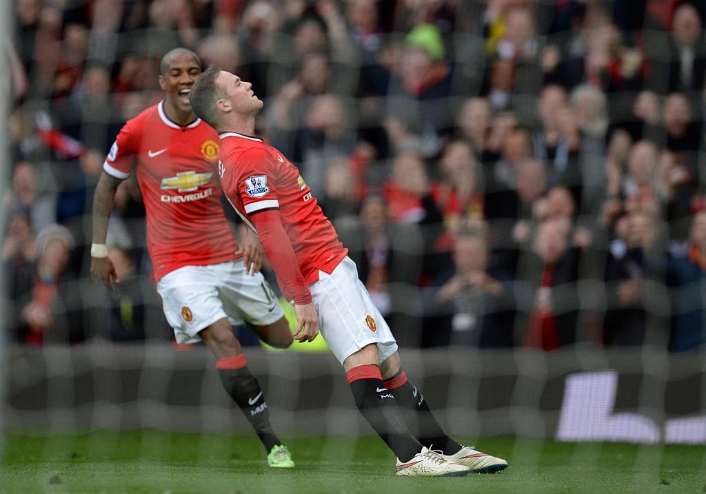 Manchester United's English striker Wayne Rooney celebrates with a topical celebration after scoring their third goal during the English Premier Le...