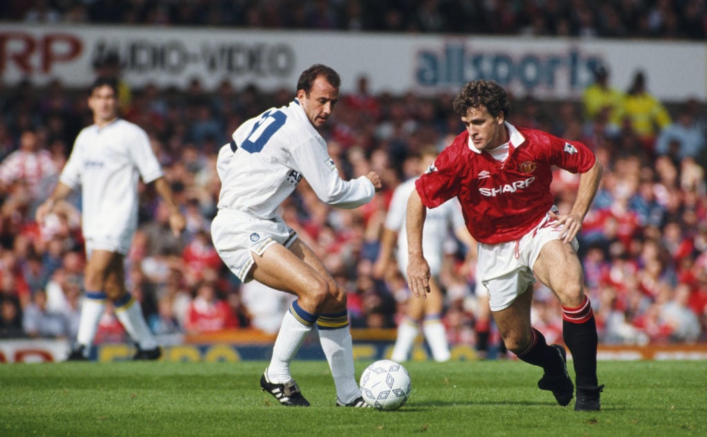 Manchester United striker Mark Hughes gets past Gary McAllister of Leeds during the Premier League match between Manchester United and Leeds United...