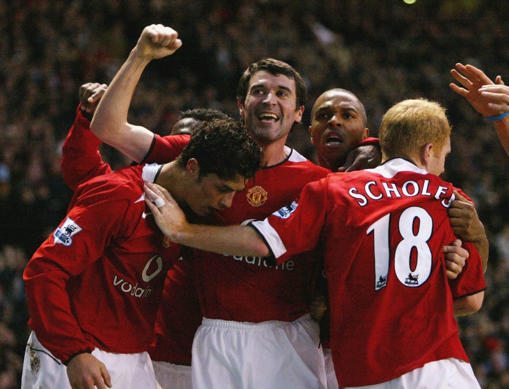 Paul Scholes of Manchester United celebrates scoring the third goal against Aston Villa with Roy Keane and Cristiano Ronaldo, during the Barclays P...