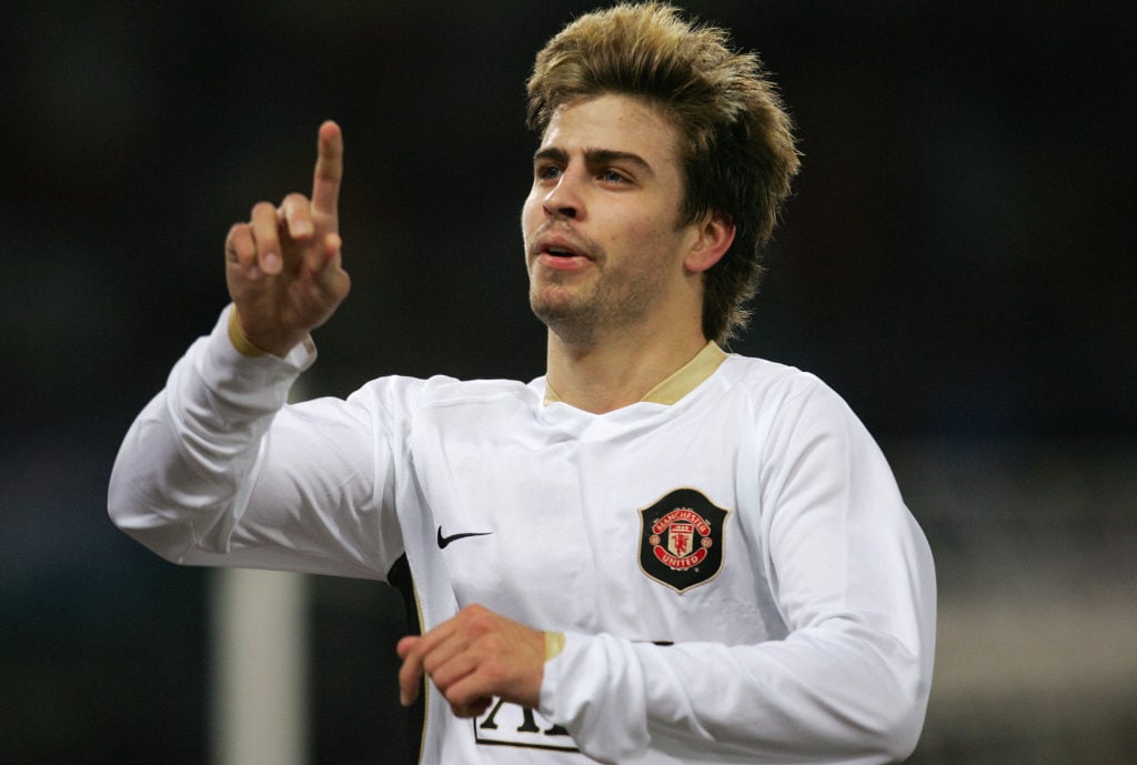 Manchester United's Spanish defender Gerard Pique jubilates after scoring against AS Roma during their UEFA Champions League Group F football match...