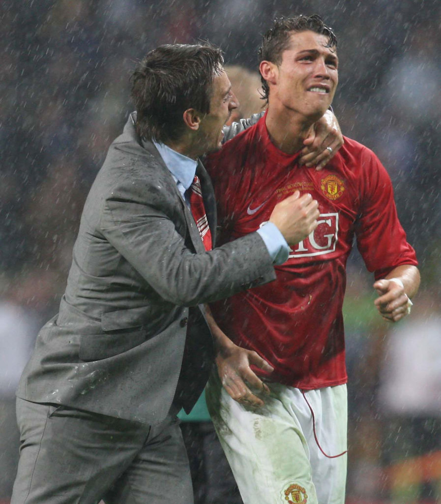 Gary Neville and Cristiano Ronaldo of Manchester United celebrate after winning the UEFA Champions League Final match between Manchester United and...